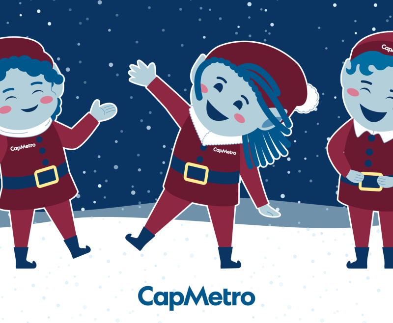 Three cute CapMetro elves dancing together in the snow with the CapMetro logo on the bottom.